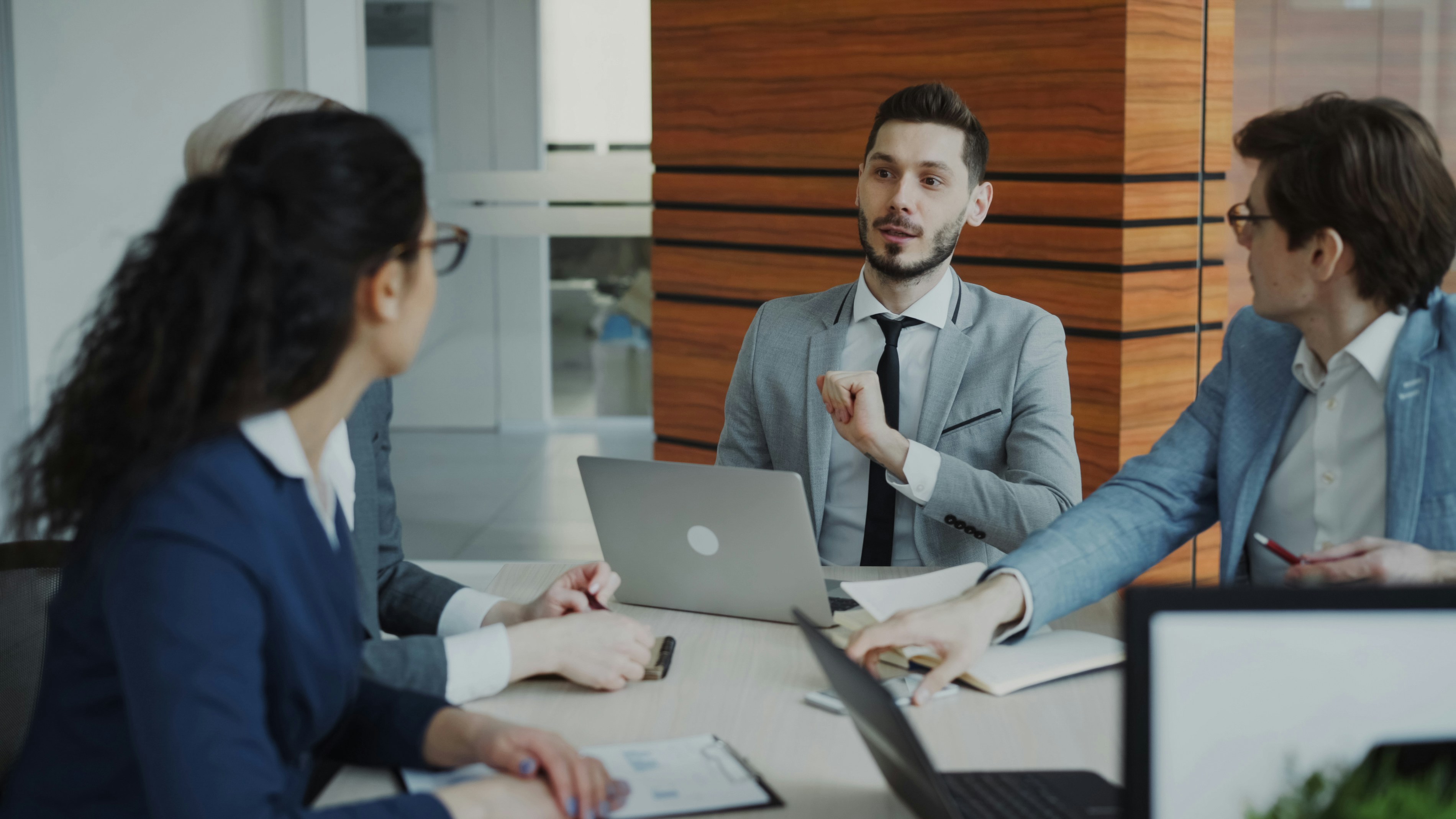 Consultants collaborating with a client team